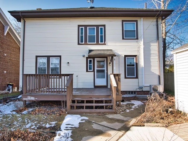 view of front of property with ac unit and a wooden deck