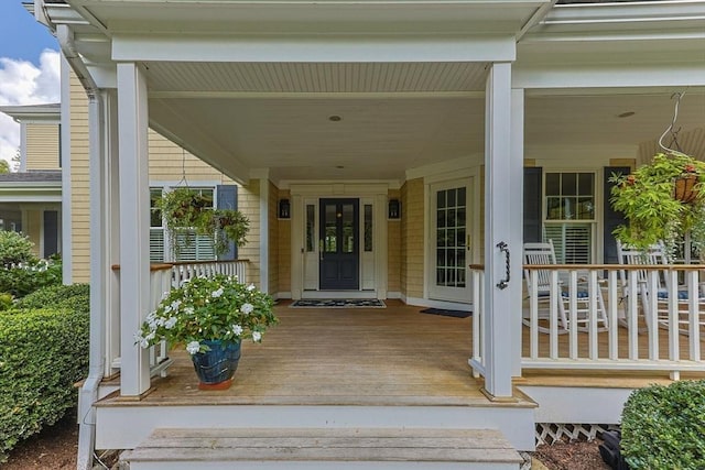 doorway to property featuring a porch