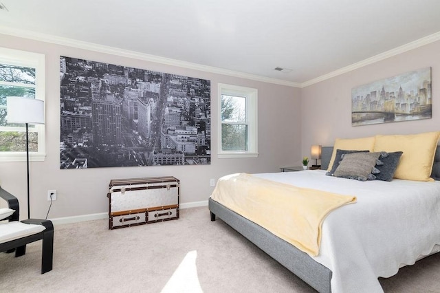 carpeted bedroom with crown molding, baseboards, and visible vents