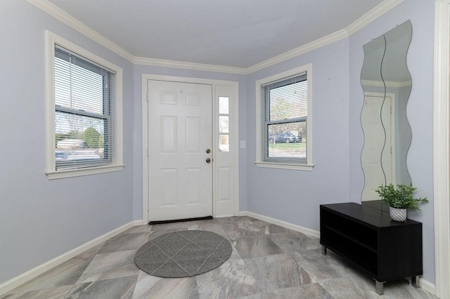 entrance foyer with crown molding and baseboards