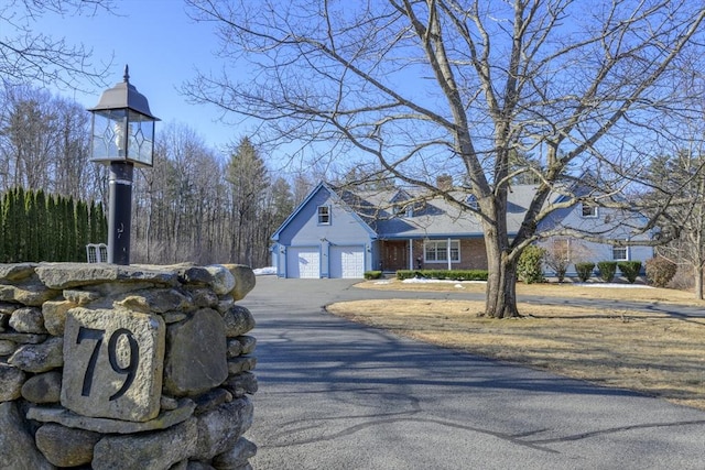 view of road with driveway
