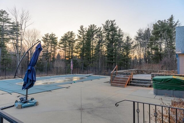 view of pool with a fenced in pool, a patio area, fence, and a grill