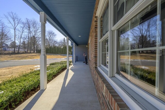 view of patio featuring a porch