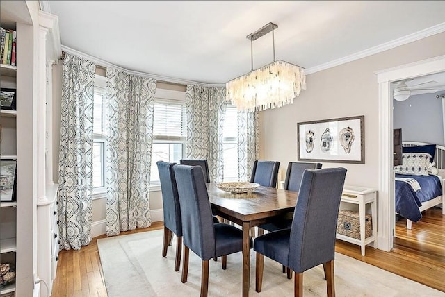8 Cambridge Ter Unit 2, Cambridge, MA 02140 - dining area with wood-type flooring, ornamental molding, and a chandelier