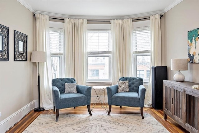 8 Cambridge Ter Unit 2, Cambridge, MA 02140 - sitting room featuring crown molding, plenty of natural light, baseboards, and wood finished floors