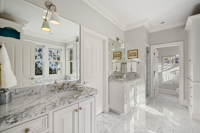 bathroom with ornamental molding, tile floors, toilet, and dual bowl vanity