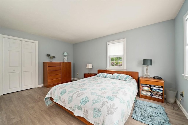 11 Brunswick St, Marshfield, MA 02050 - bedroom featuring wood finished floors, a closet, and baseboards
