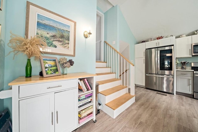 11 Brunswick St, Marshfield, MA 02050 - stairs featuring wood finished floors and lofted ceiling