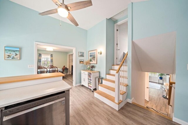 11 Brunswick St, Marshfield, MA 02050 - staircase featuring wood finished floors, a ceiling fan, and baseboards