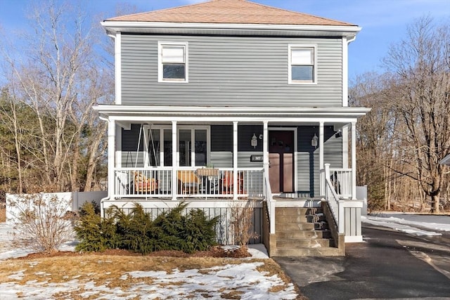 view of property with a porch