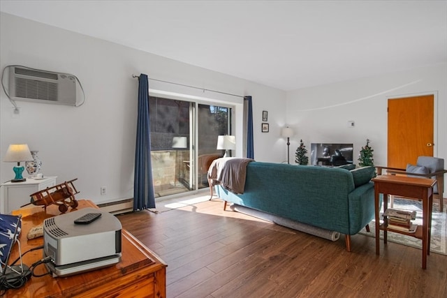 living room featuring wood-type flooring, a baseboard radiator, and an AC wall unit