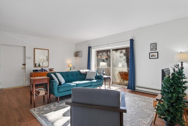 living room with a wall mounted air conditioner, dark hardwood / wood-style floors, and a baseboard radiator