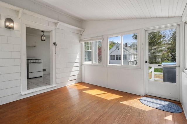 unfurnished sunroom featuring a wealth of natural light