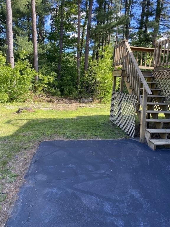 62 Duncan Rd, Stoughton, MA 02072 - view of grassy yard with stairs and a patio area