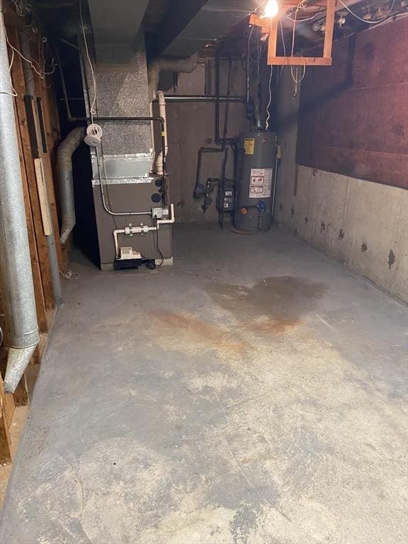 62 Duncan Rd, Stoughton, MA 02072 - unfinished below grade area with water heater and heating unit