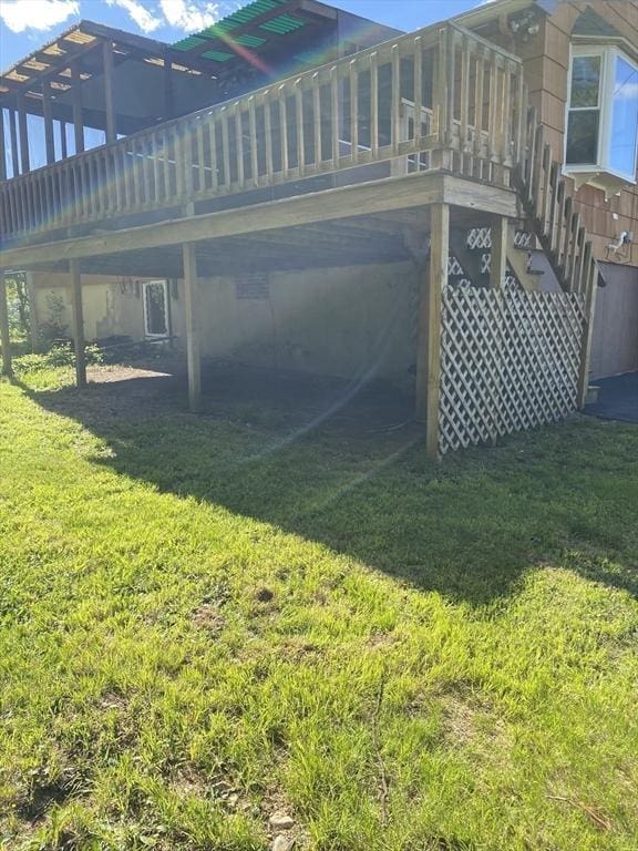 62 Duncan Rd, Stoughton, MA 02072 - rear view of house featuring a deck, a yard, and stairway