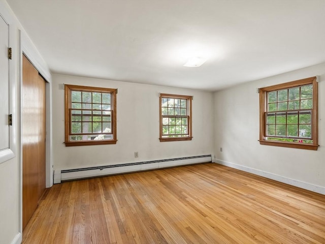 51 Quaboag Rd, Acton, MA 01720 - spare room featuring a baseboard radiator and light wood finished floors