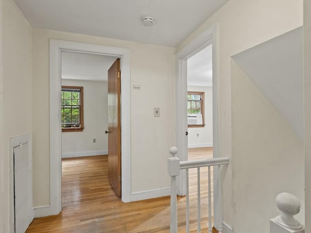51 Quaboag Rd, Acton, MA 01720 - hallway featuring light wood-type flooring, healthy amount of natural light, and an upstairs landing