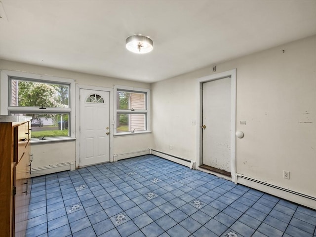 51 Quaboag Rd, Acton, MA 01720 - entryway with baseboard heating and tile patterned floors