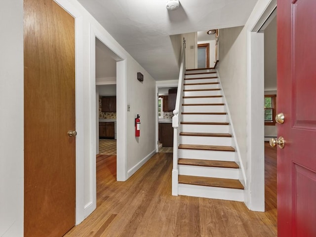 51 Quaboag Rd, Acton, MA 01720 - stairway with wood finished floors and baseboards
