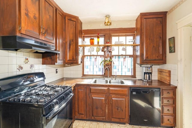 kitchen featuring tasteful backsplash, sink, and black appliances