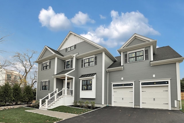 view of front of property with a garage