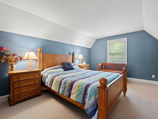11 Grove Point Rd, Wales, MA 01081 - bedroom with vaulted ceiling, carpet flooring, and baseboards