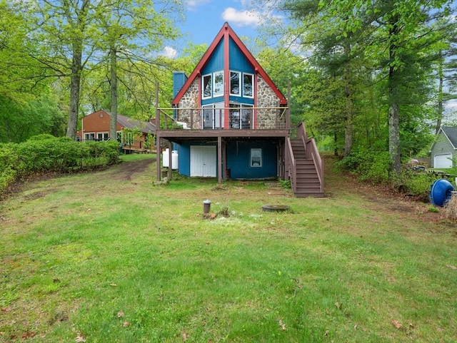 11 Grove Point Rd, Wales, MA 01081 - back of property with stairs, a deck, and a yard