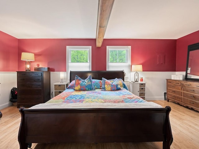 11 Grove Point Rd, Wales, MA 01081 - bedroom with wainscoting, wood finished floors, and beamed ceiling