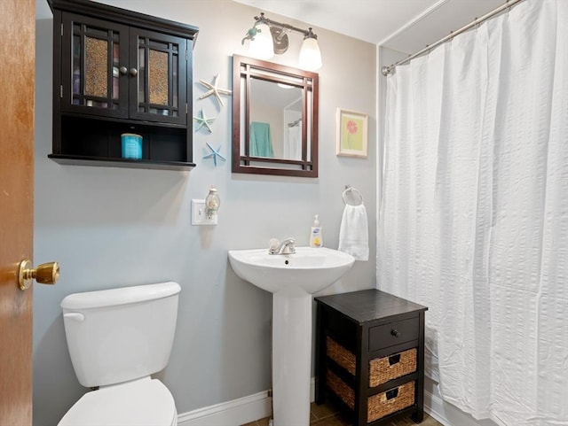 11 Grove Point Rd, Wales, MA 01081 - bathroom with toilet, baseboards, a sink, and curtained shower