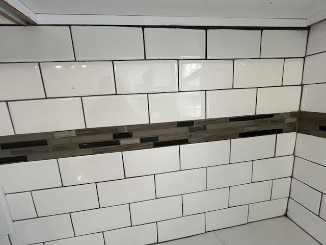 details with a tile shower