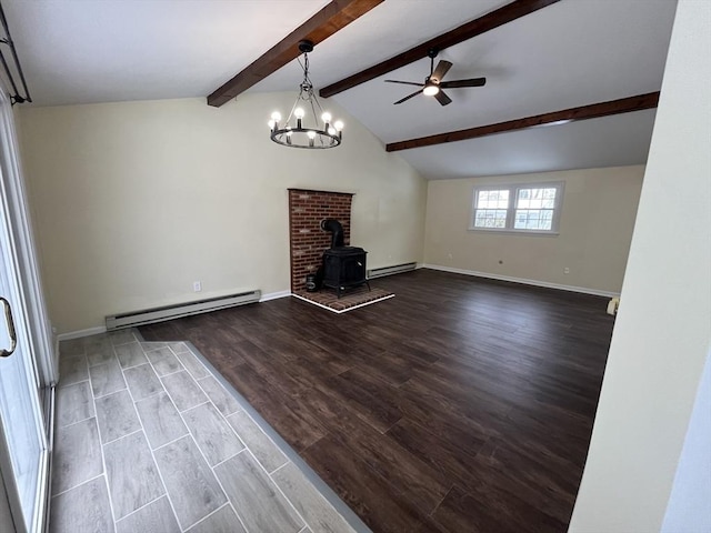 unfurnished living room with vaulted ceiling with beams, a baseboard radiator, a wood stove, ceiling fan, and wood finished floors