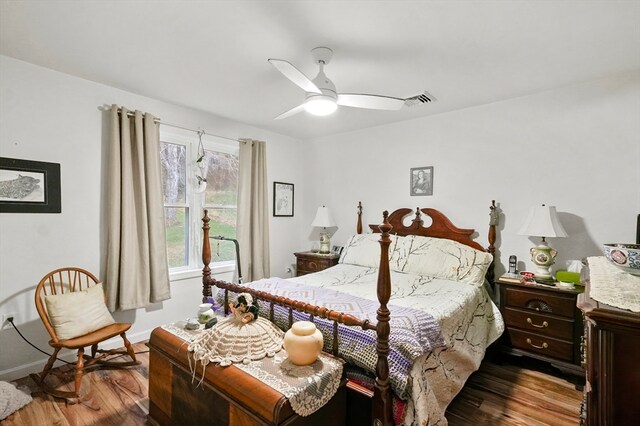 bedroom with ceiling fan and hardwood / wood-style floors