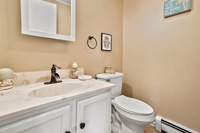 bathroom with vanity, a baseboard radiator, and toilet