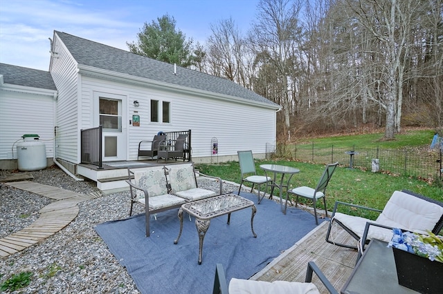 view of patio with an outdoor hangout area and a deck