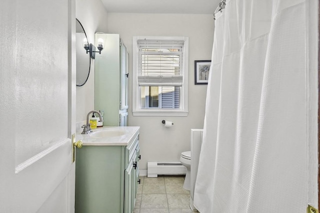 bathroom with a baseboard radiator, walk in shower, tile patterned flooring, toilet, and vanity