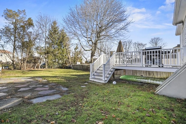 view of yard featuring a wooden deck