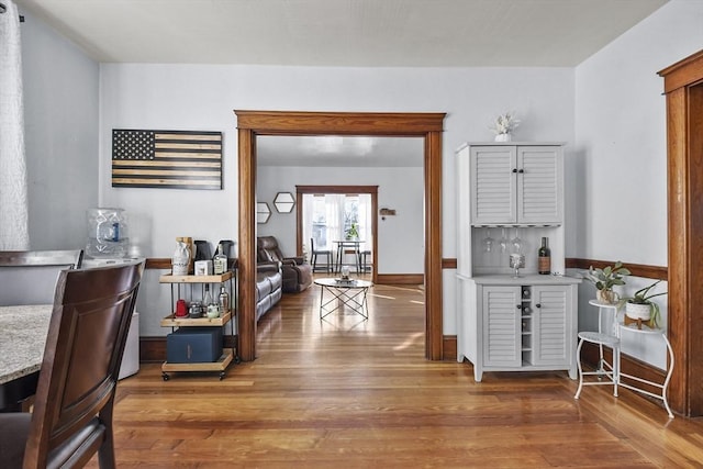 hallway featuring dark hardwood / wood-style flooring