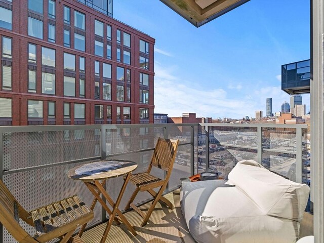 balcony featuring a view of city