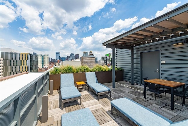 wooden terrace with a view of city