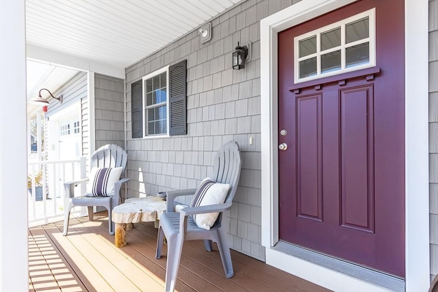 entrance to property with covered porch