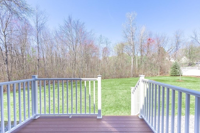 wooden deck with a yard