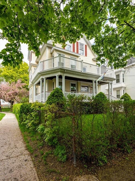 27 Stephen St, Lynn, MA 01902 - view of front facade with a balcony and covered porch