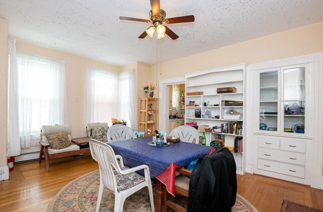 27 Stephen St, Lynn, MA 01902 - dining space with a ceiling fan, light wood-type flooring, and a textured ceiling