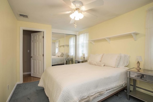 374 Forest St, Raynham, MA 02767 - carpeted bedroom with a closet, baseboards, a ceiling fan, and baseboard heating