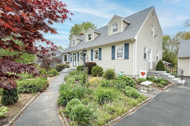374 Forest St, Raynham, MA 02767 - cape cod home featuring roof with shingles