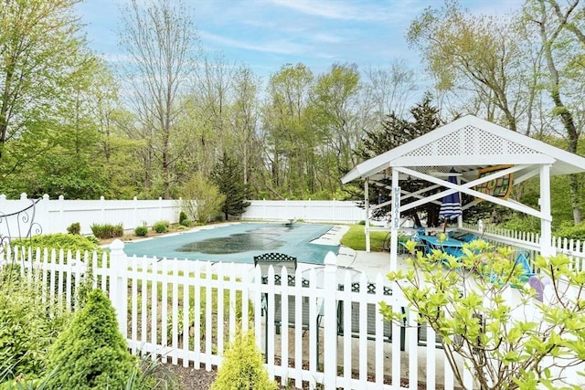 374 Forest St, Raynham, MA 02767 - fenced backyard featuring a gazebo and a patio area