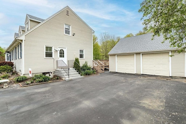 374 Forest St, Raynham, MA 02767 - view of side of home featuring a garage