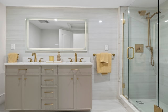 bathroom featuring walk in shower, tile walls, and vanity