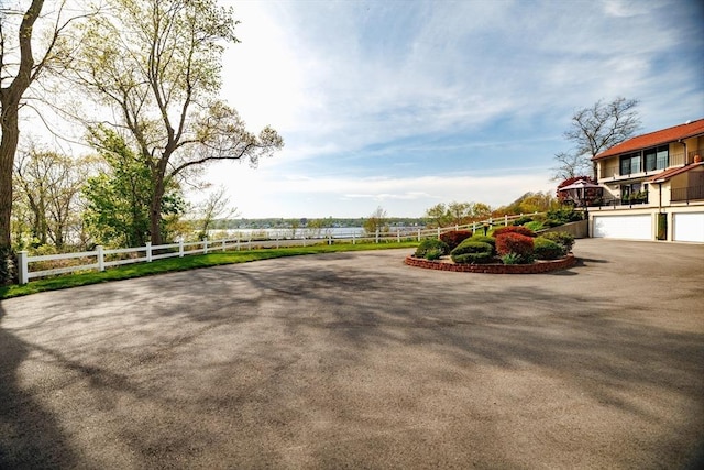 exterior space with aphalt driveway